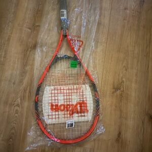 Red and Black Tennis Racket